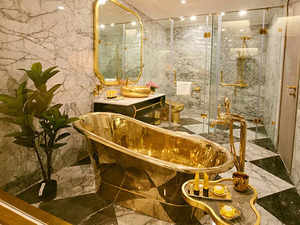 Inside world's first gold-plated hotel: Tubs, sinks, toilets, cutlery gold-pated, food topped with edible gold