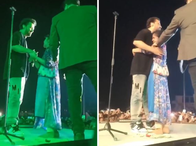 Atif Aslam with his fan during the live concert.