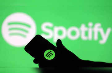 Spotify surges 16% on swing to profit, boost in paid subscribers