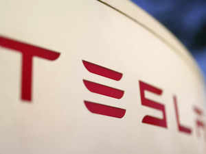 Tesla's profit drop raises strategy concerns:Image
