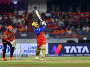 Hyderabad: Royal Challengers Bangaluru batter Rajat Patidar plays a shot during ...