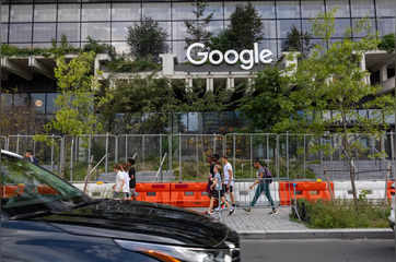 Google parent announces first-ever dividend; beats on sales, profit; shares soar