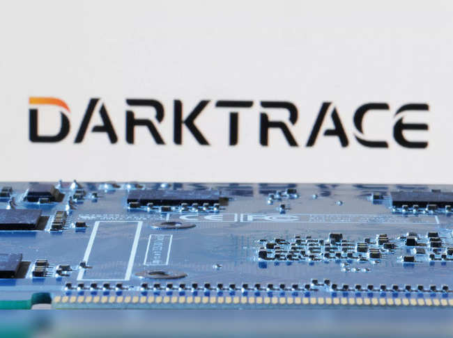 Illustration shows Darktrace logo