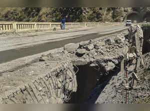 Ramban: A damaged portion of the Jammu-Srinagar national highway after a landsli...