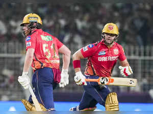 Kolkata: Punjab Kings' Jonny Bairstow and Rilee Rossouw run between the wickets ...