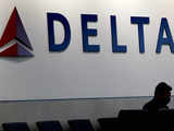 An emergency slide falls off a Delta Air Lines plane, forcing pilots to return to JFK in New York