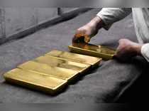 Gold eases as steady dollar dampens appeal
