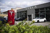 Tesla to cut hundreds more jobs in Musk cost push