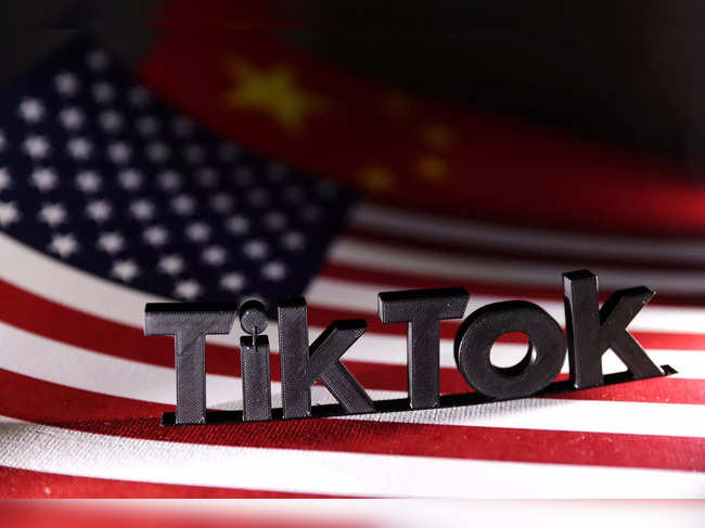 Illustration shows TikTok logo, U.S. and Chinese flags