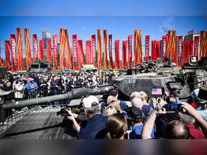 People look at western military equipment captured by Russian forces in Ukraine, displayed at the WWII memorial complex at Poklonnya Hill western in Moscow, on May 1, 2024.