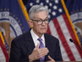 Fed holds rates steady, flags 'lack of further progress' on :Image