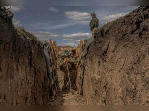 In this photo taken on April 4, 2024, Ukrainian servicemen prepare a trench system in the Donetsk region, amid the Russian invasion of Ukraine.