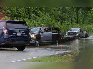 Heavy rains near Houston close schools and flood roadways as officials urge residents to evacuate