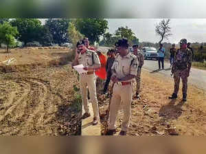**EDS: GRAB VIA PTI VIDEO** Shahdol: Police personnel inspects the area where a ...