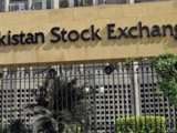Pakistan's benchmark share index rises as much as 1.5%