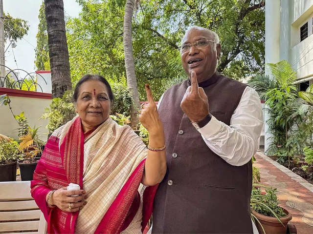 Kharge and family voting
