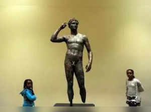 Italy stakes claim to Greek bronze in Getty Museum.