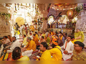 **EDS: IMAGE VIA @ShriRamTeerth** Ayodhya: Priests and devotees offer prayers to...