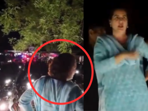 When Priyanka Gandhi couldn't find a microphone during a public roadshow in Raebareli, Uttar Pradesh, she climbed atop a vehicle and addressed the crowd. Despite the darkness after sunset, flashlights illuminated the scene as she spoke.