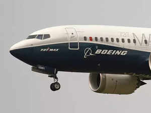 Boeing 737 catches fire and skids off the runway at a Senegal airport, injuring 10 people