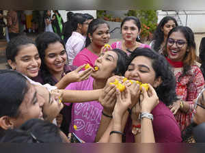Thiruvananthapuram: School students celebrate after the Class 12 exam results we...