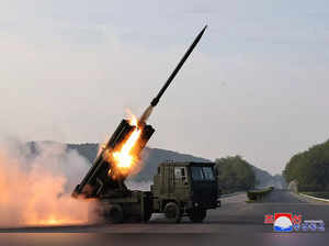 This picture taken on May 10, 2024 and released from North Korea's official Korean Central News Agency (KCNA) on May 11, 2024 shows the test firing of the 240mm multiple rocket launcher system at an undisclosed location in North Korea.