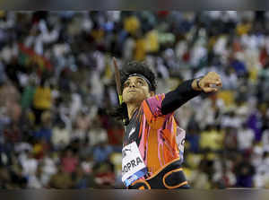 Neeraj Chopra, of India, makes an attempt in the men's javelin throw during the ...
