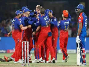 RCB keep playoffs hope alive after beating DC by 47 runs.