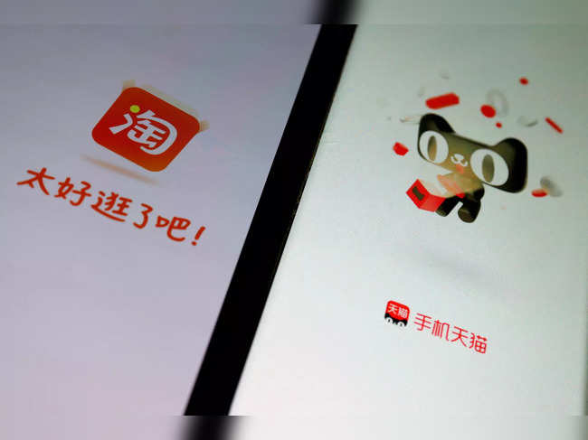FILE PHOTO: Illustration picture of Alibaba's e-commerce apps Taobao and Tmall
