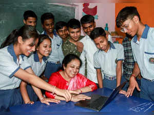 Gurugram, May 12 (ANI): Students check their results on a laptop as Haryana Boar...
