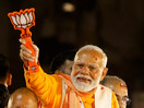 PM Modi holds roadshow in Varanasi, to file nomination on Tuesday