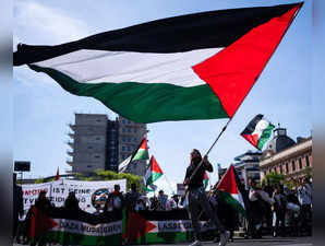 Demonstrators wave the Palestinian flag during a pro-Palestinian demonstration at Columbus Square in Vienna, Austria on May 4, 2024, under the slogan 'Together for Palestine - ceasefire right now!'