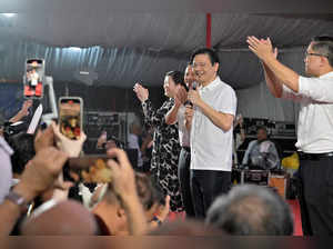 Singapore's fourth Prime Minister, Lawrence Wong, speaks to supporters at a community event after the swearing-in ceremony in Singapore