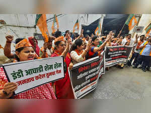 Thane: BJP Mahila Morcha workers raise slogans during a protest against the West...