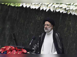 FILE - Iranian President Ebrahim Raisi delivers a speech after taking his oath a...