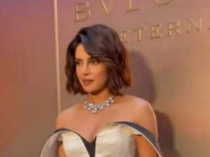 Take a look at Priyanka Chopra's new hairdo! Desi Girl sizzles in a white & black dress at Bvlgari e:Image