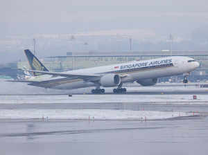 FILE PHOTO: Boeing 777-312ER aircraft of Singapore Airlines takes off from Zurich Airport near Ruemlang
