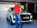 Salman Khan poses next to an Audio Q7 