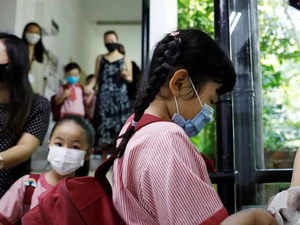 Singapore seeing new COVID-19 wave, minister advises wearing of masks