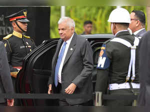 Sri Lanka's President Ranil Wickremesinghe (C) arrives for the 10th World Water Forum in Nusa Dua, Indonesia's Bali island, on May 20, 2024.