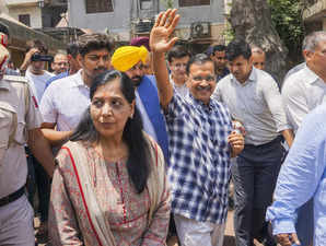 New Delhi: Delhi Chief Minister Arvind Kejriwal visits Navagraha Mandir a day af...