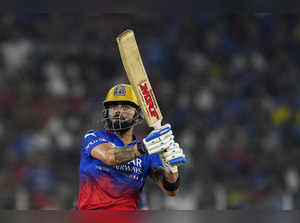 Ahmedabad: Royal Challengers Bengaluru player Virat Kohli plays a shot during th...