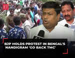 BJP holds protest over killing of woman party worker in Bengal's Nandigram 'Go back TMC'