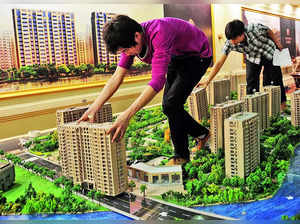 Two Chinese Megacities Lift Curbs on Buying Homes.