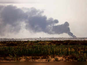 Smoke rises above southern Gaza, amid the ongoing conflict in Gaza between Israel and Palestinian Islamist group Hamas, as seen from Israel's border with Gaza