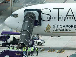 Over 20 passengers injured in turbulence on Singapore Airlines flight being treated for spinal injuries, hospital says