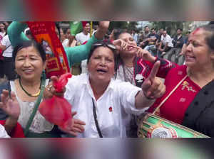 **EDS: VIDEO GRAB** Gangtok: Sikkim Krantikari Morcha (SKM) supporters celebrate...