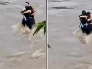 Video of 3 friends sharing a hug before being engulfed by floods shakes Internet:Image