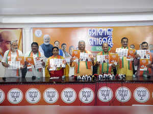 Bhubaneswar, Apr 22 (ANI): Odisha BJP chief Manmohan Samal with party state in-c...