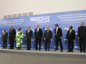From left, India's BRICS Sherpa Dammu Ravi, Egypt's Foreign Ministers Sameh Shou...